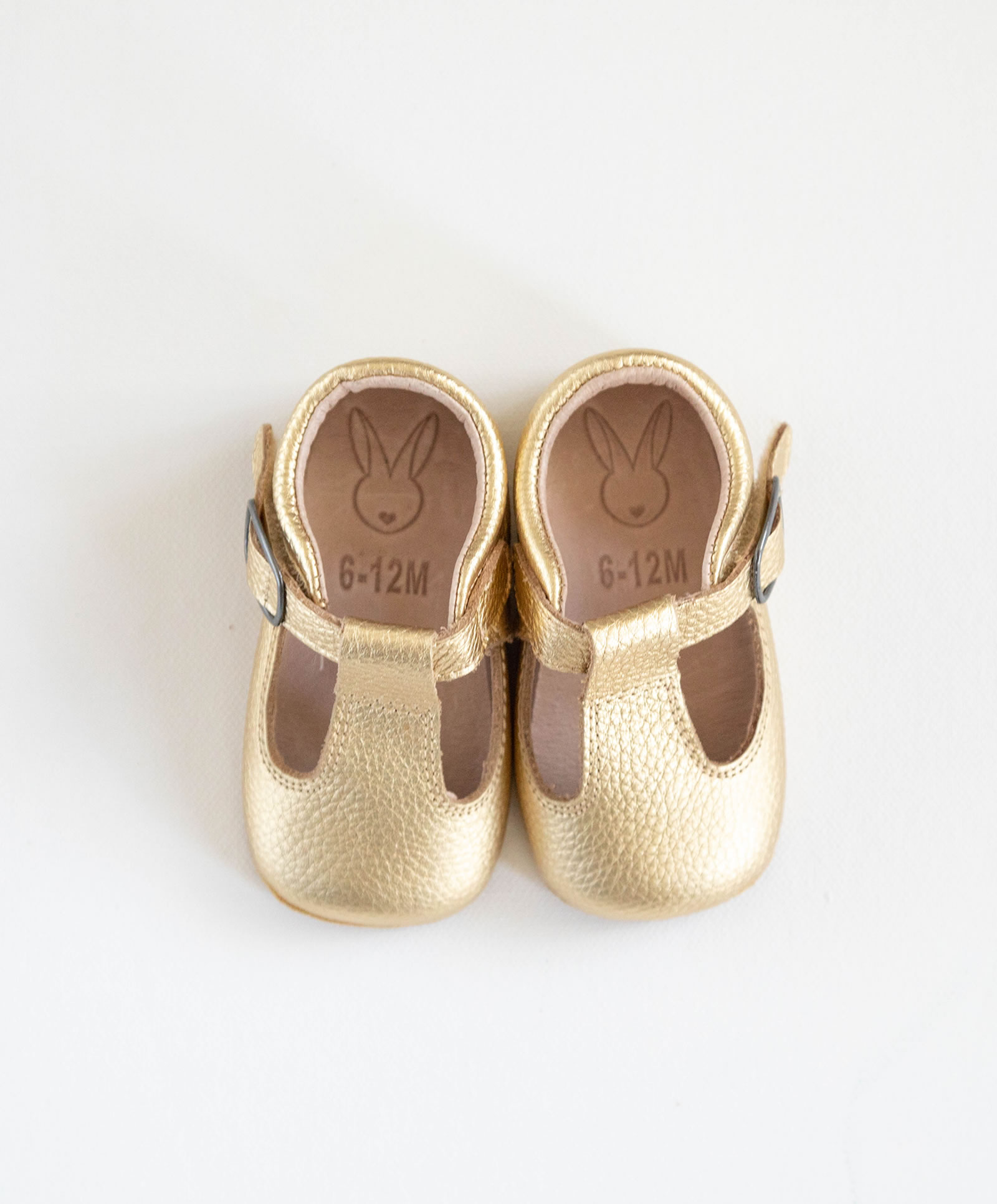 gold baby shoes